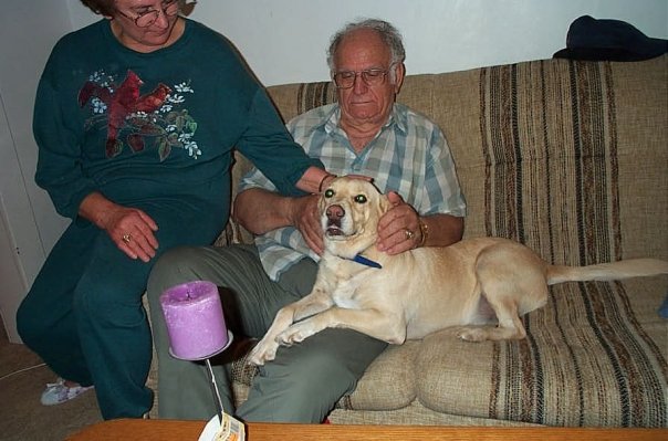 My dad with Kobe. It took him awhile, but he learned to love dogs.